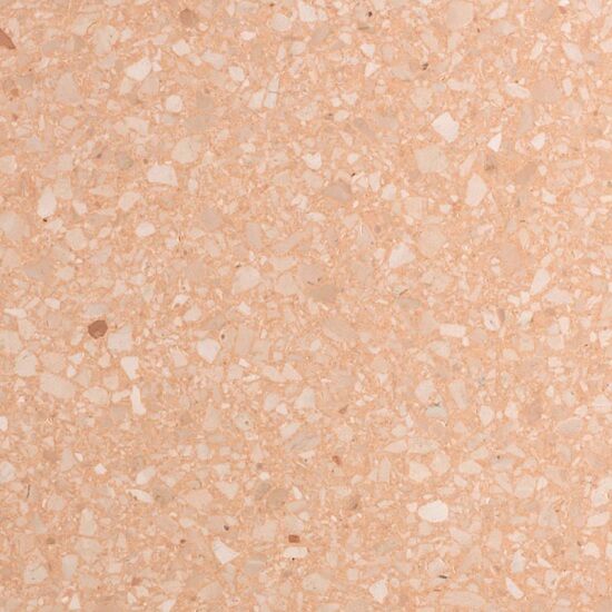 a close-up of terrazzo Rosa, a stone with a delicate pink base